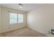 Empty bedroom offers natural light, closet space, and carpeted floors at 4101 Dunwoody Club Dr # 49, Atlanta, GA 30350