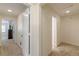 Hallway featuring neutral paint, carpet, and white doors at 4101 Dunwoody Club Dr # 49, Atlanta, GA 30350