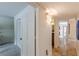 Hallway featuring tile flooring, neutral walls, and access to living spaces at 4101 Dunwoody Club Dr # 49, Atlanta, GA 30350