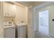 Bright laundry room featuring modern washer and dryer at 4101 Dunwoody Club Dr # 49, Atlanta, GA 30350