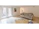 Inviting living room with tile floors and glass doors to outdoor patio at 4101 Dunwoody Club Dr # 49, Atlanta, GA 30350