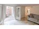 Bright living room with tile flooring and access to the outdoor patio at 4101 Dunwoody Club Dr # 49, Atlanta, GA 30350