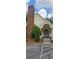 Community clubhouse features a brick chimney and covered entryway at 1231 Creek Forest Ln, Austell, GA 30106