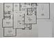 Detailed floor plan showcasing the layout of the bedrooms, living areas, kitchen, and bathrooms at 1231 Creek Forest Ln, Austell, GA 30106