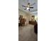 Main bedroom featuring a ceiling fan, carpet, and standard closet at 1231 Creek Forest Ln, Austell, GA 30106