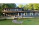 Charming two-story home with large front porch and a traditional architectural style at 145 Huntcliff Ct, Fayetteville, GA 30214