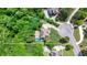 Aerial view of the home on a 1.65 acre lot surrounded by mature trees at 255 Ashmere Ct, Tyrone, GA 30290