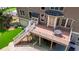 Expansive deck overlooking the backyard, with stairs to a lower patio and entertainment area at 255 Ashmere Ct, Tyrone, GA 30290