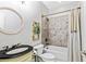 Charming bathroom with a shower-tub combo, decorative tile, and stylish vanity at 255 Ashmere Ct, Tyrone, GA 30290
