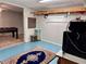 Basement area with foosball table, workspace, and shelving at 1345 Starboard Way, Cumming, GA 30041