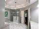 Bathroom with glass shower, granite countertops, and tile floor at 1345 Starboard Way, Cumming, GA 30041