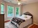 Bedroom with two windows overlooking the trees at 1345 Starboard Way, Cumming, GA 30041
