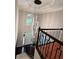 View from the second floor of the light fixture that greets you as you enter this home at 1345 Starboard Way, Cumming, GA 30041