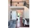 Lovely foyer with staircase and a cozy living space with hardwood floors at 1345 Starboard Way, Cumming, GA 30041