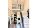 Grand foyer with soaring ceilings, hardwood floors, and staircase at 1345 Starboard Way, Cumming, GA 30041