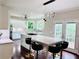 Kitchen with a center island, pendant lights, and stainless steel appliances at 1345 Starboard Way, Cumming, GA 30041
