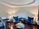 Cozy living room with stylish furniture, modern decor, and staircase access at 1345 Starboard Way, Cumming, GA 30041