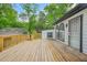 Spacious wooden deck with railing overlooking the yard, great for outdoor entertaining at 1712 Venetian Sw Dr, Atlanta, GA 30311
