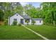 Charming home with well-maintained front lawn and landscaping at 1712 Venetian Sw Dr, Atlanta, GA 30311