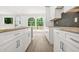 Kitchen featuring stainless steel appliances, granite countertops, and shaker cabinets at 1712 Venetian Sw Dr, Atlanta, GA 30311