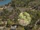 Aerial view highlighting the secluded home site among the trees on this wooded lot at 2270 Emerald Dr, Jonesboro, GA 30236