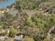 Expansive aerial view of a lakeside community surrounded by lush greenery and serene water at 2270 Emerald Dr, Jonesboro, GA 30236