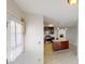 Open kitchen with stainless steel appliances, island, and view of the living area at 4884 Antelope Cv, Atlanta, GA 30349