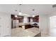 Well-equipped kitchen features granite countertops, stainless steel appliances, a breakfast bar, and ample cabinet space at 4884 Antelope Cv, Atlanta, GA 30349