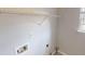 Laundry room with hookups and white walls at 4884 Antelope Cv, Atlanta, GA 30349