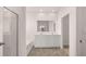Bathroom boasts double sinks, a soaking tub, and a separate shower with glass doors at 616 Kimberwick Dr, Locust Grove, GA 30248