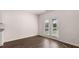 Bright dining area features patio door and wood-look flooring at 616 Kimberwick Dr, Locust Grove, GA 30248
