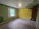 Bedroom with whimsical wall art and a large window providing natural light at 639 Royal Abbey Dr, Stone Mountain, GA 30088