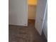 Cozy bedroom showing neutral carpeting and a doorway to a closet or bathroom at 639 Royal Abbey Dr, Stone Mountain, GA 30088
