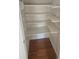 Walk-in pantry with ample storage space and wooden shelves at 639 Royal Abbey Dr, Stone Mountain, GA 30088