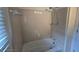 Shower with tile surround and shower head at 639 Royal Abbey Dr, Stone Mountain, GA 30088