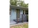 Close-up of the home's stylish entrance with a modern door and gray porch at 2274 Edgemore Se Dr, Atlanta, GA 30316