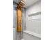 A modern walk-in shower features sleek fixtures, gray tile, and a built-in shower seat at 2274 Edgemore Se Dr, Atlanta, GA 30316