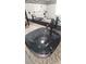 Stylish bathroom featuring granite counters, vessel sinks, and modern fixtures with ample counter space at 2477 Briar Valley Way, Dacula, GA 30019