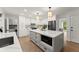 Updated kitchen with quartz countertops, white cabinets, and a view to the breakfast area at 4433 Windsor Oaks Cir, Marietta, GA 30066