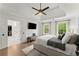 Spacious main bedroom suite with hardwood floors, tray ceiling, walk-in closet, and ensuite bathroom at 4433 Windsor Oaks Cir, Marietta, GA 30066