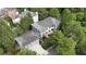 Aerial view of the home showcasing its well-manicured lot, pool, and surrounding neighborhood at 6805 Bucks Rd, Cumming, GA 30040