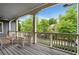 Charming porch with comfortable wicker furniture, great for outdoor relaxation at 6805 Bucks Rd, Cumming, GA 30040
