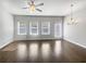 Bright, open living space featuring hardwood floors, recessed lighting, and natural light at 7119 Gladstone Cir, Lithonia, GA 30038