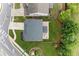 A beautiful aerial view shows the home's layout, green lawn, and proximity to nearby streets at 100 Grove View Rd, Woodstock, GA 30189