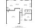 Detailed first floor plan showcasing the layout of the kitchen, living room, and garage at 100 Grove View Rd, Woodstock, GA 30189