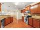Modern kitchen featuring stainless steel appliances and a breakfast bar at 3700 Long Lake Dr, Douglasville, GA 30135