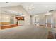 Bright living room boasts hardwood floors and a seamless flow into adjacent rooms at 3700 Long Lake Dr, Douglasville, GA 30135