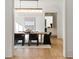Bright dining room features a contemporary chandelier, table, and chairs at 490 Mount Paran Rd, Atlanta, GA 30327