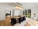 Dining room view to living room with fireplace, with ample natural light at 490 Mount Paran Rd, Atlanta, GA 30327
