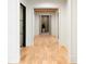 Spacious hallway featuring hardwood floors and neutral paint at 490 Mount Paran Rd, Atlanta, GA 30327